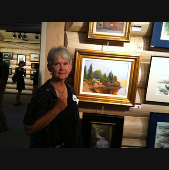 Susan Novak and her painting of cabin 6